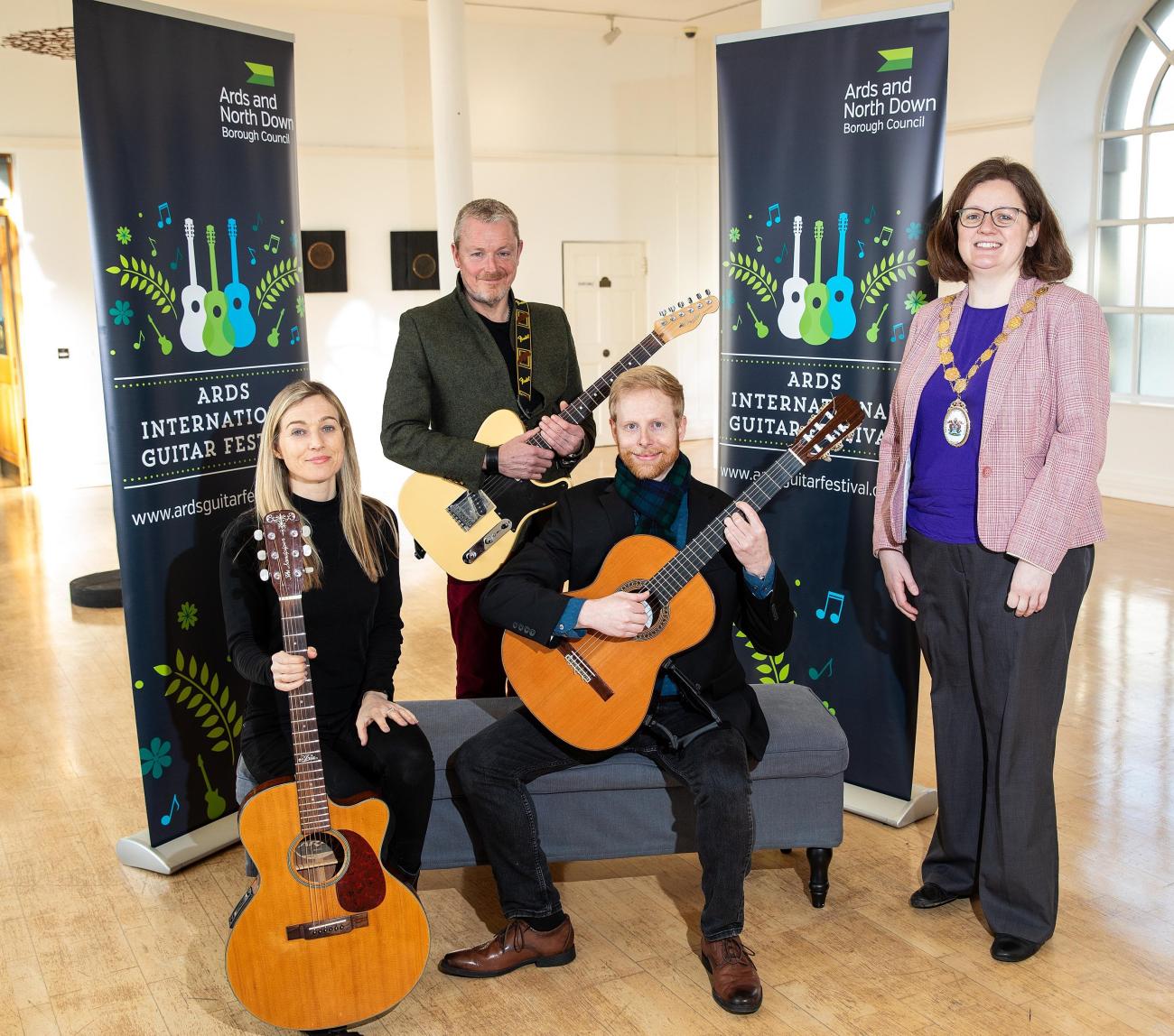 Ards International Guitar Festival 2024 launch photo with guitarists and the Mayor of Ards and North Down
